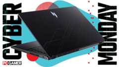 An Acer gaming laptop on a PC Gamer Cyber Monday Deals background