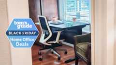 Branch Ergonomic Chair pushed in at a desk next to a window with a Tom's Guide Black Friday deals badge