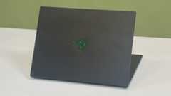 A Razer Blade 14 (2025) on a desk with its lid facing the viewer