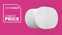 The Sonos Era 300 on a magenta background featuring the words &#039;Lowest price&#039;.