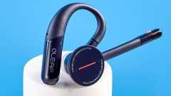 Oleap Archer AI Meeting Headset photographed in front of a blue background.