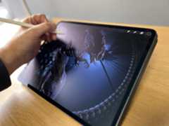 An Apple iPad Pro (M4, 2024) sitting on a wooden desk