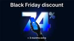 NordVPN Black Friday 2025 discount graphic. The image shows a hand holding a mobile phone displaying the NordVPN logo, in front of a large 74% graphic. white text at the top and bottom says Black Friday discount and + 3 months extra.