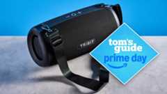 Tribit StormBox Lava Bluetooth Speaker photographed in front of a blue background. 