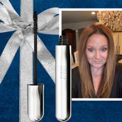 mature woman in a gift wrap with sarah creal makeup products