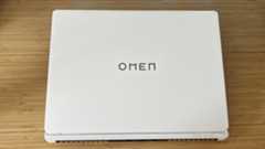 HP Omen Max 16 gaming laptop lid on a wooden desk