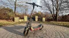 Segway Kickscooter ZT3 Pro parked on sidewalk