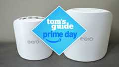 Eero Pro 7 and Eero Max 7 on a desk with a Tom's Guide Prime Day deals badge