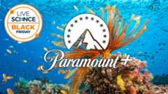 Fish and coral and underwater plant life on the great barrier reef with the live science black friday logo and paramount+ streaming logo overlaid
