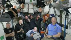 SpaceX&#039;s Ax-1 private astronauts make a number one gesture for their flight after joining the Expedition 67 crew on the International Space Station and getting their astronaut wings on April 9, 2022.