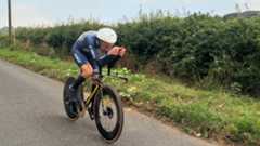Action shot of author Aaron Borrill riding one of the best time trial helmets in a time trial race