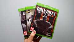 Call of Duty Black Ops 3, Infinite Warfare, and WWII game cases for the Xbox One. 