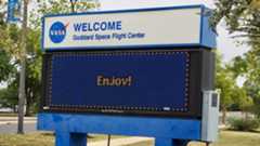 a nasa sign says Enjoy!