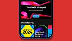 A phone on a red background showing a Spotify Wrapped 2024 banner