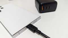 Samsung Galaxy S24 Ultra charging via a USB-C cable.