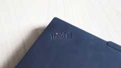 A close up of the Thinkpad logo