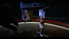 a docked spacecraft and space station modules are set against a starfield and the Aurora Australis (southern lights) above the horizon of Earth