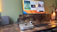 M2 Mac mini on a wooden desk