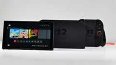 Nintendo Switch 2, Dock, Joy-Con 2 Grip, and Straps displayed on a white desk.