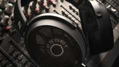 A pair of Sennheiser HD 490 Pro studio headphones on a mixing desk