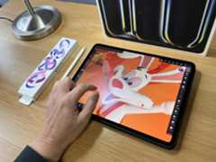 An Apple iPad Pro (M4, 2024) sitting on a wooden desk