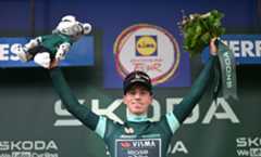 Matthew Brennan in the green jersey on stage at the Deutschland Tour