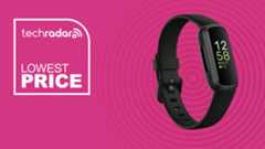 The Fitbit Inspire 3 on a pink background with text saying Lowest Price.