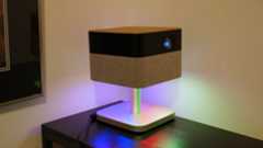 Epson Lifestudio Flex Plus on table with colored lights