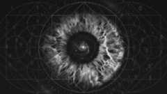 Illustration of a spiral galaxy within a human iris and sacred geometry symbols