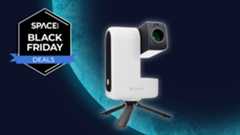 The ZWO Seestar S30 smart telescope on a blue planet background, with a black Space.com Black Friday deals badge in the upper left corner.