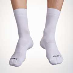 Male cyclist wearing the Rapha Pro Team cycling socks