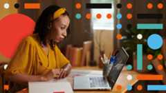 woman at a computer with dots around her