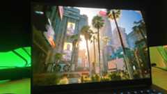 Razer Blade 16 2025 gaming laptop running Cyberpunk 2077 with DLSS enabled