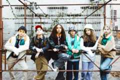 Gen alpha teenagers stood in a row