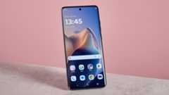 Motorola Edge 60 Fusion against a pink background with display on