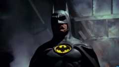 Michael Keaton as The Dark Knight appearing from the shadows in 1989&#039;s Batman.