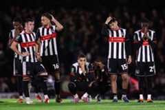 Grimsby players during their 12-11 shootout win over Man United