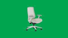 The Branch Ergonomic Chair Pro on a green background. 
