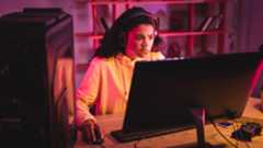 PC gamer looking confused at monitor