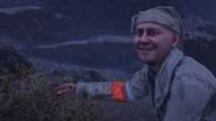 Jim indicates a bush he thinks would be good for peeing behind