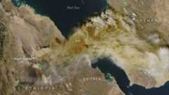 An image of Earth from space, showing Ethiopia and the Middle East covered with brown and gray streaks of ash