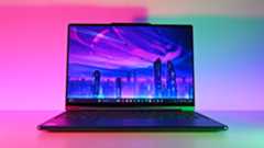 Photos of the Lenovo Yoga 9i 2-in-1 (2025) Intel Aura Edition 14-inch laptop. 