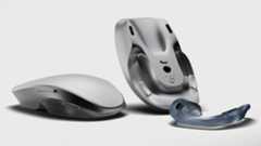 Melt Mouse; a silver mouse on a white background