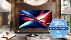 Hisense U8QG on wall in living room with Black Friday tag