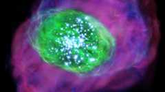 A swirl of green light around a series of white dots shows a young galaxy, with purple around the green lit bubble