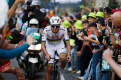 BERGAMO, ITALY - OCTOBER 11: Tadej Pogacar of Slovenia and Team UAE Team Emirates competes in the breakaway while fans cheers during the 119th Il Lombardia 2025 a 241km one day race from Como to Bergamo on October 11, 2025 in Bergamo, Italy. (Photo by Luca Bettini - Pool/Getty Images)