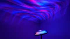 The Govee Uplighter is projecting ripples of blue and pink onto the ceiling. 