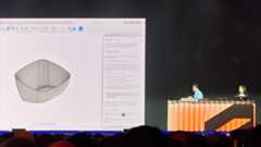 AU 2025; a CAD demo on a stage
