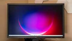 The BenQ SW321C monitor on a desk