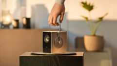 LG Cinebeam Q being held from its handle